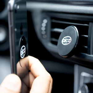 Magnetic phone holder for ventilation grille